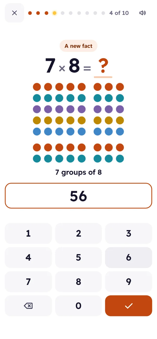 A Multiplication question on a phone, shown as rows of dots with a number pad